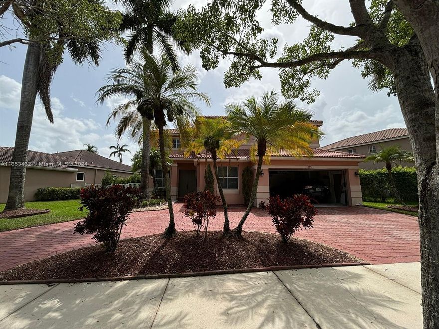 Amazing Single-Family Home in the Sought-After Gated Community of Savanna. This stunning 2-story residence features a soaring high ceiling and tile floors on the first floor. The thoughtfully designed floor plan includes 1 bedroom and a full bathroom on the main level. The open kitchen connects to the spacious family room, living room, and dining room. The expansive main bedroom comes with generous closet space. Enjoy the extended covered patio with a stunning pool. This home offers 6 bedrooms, 4 full baths, a 2-car garage, a separate laundry room, 2 A/C units, and accordion shutters. The community boasts a clubhouse with amenities and a ballroom/party area for rent.