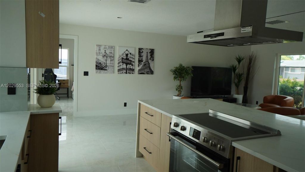 Photo of 8105 NW 74th Ter, Tamarac, FL 33321 (MLS # A12029553)