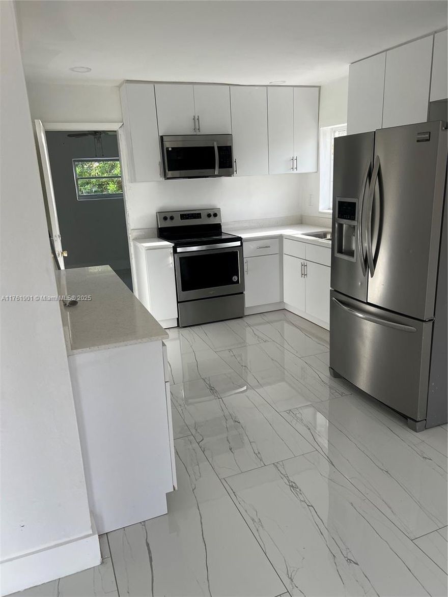 Beautiful remdoeld 3 bedroom 2 bath home in miami gardens. Near shopping centers and more. Property is gated all around. recently remodeled. The remodeling is nearly completed. if an investor wants to pick up where the previous owner left off they most certainly can. Not much needs to be added. Dont miss this opportunity. schedule a showing today.