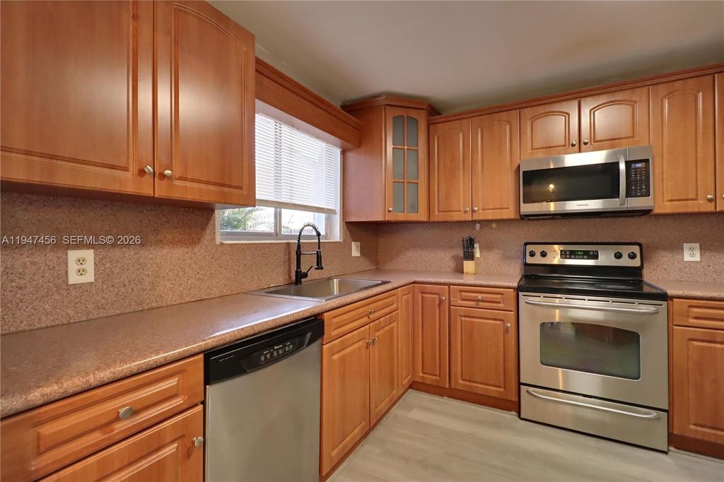 Photo of 2149 W Discovery Cir W #1, Deerfield Beach, FL 33442 (MLS # A11947456)