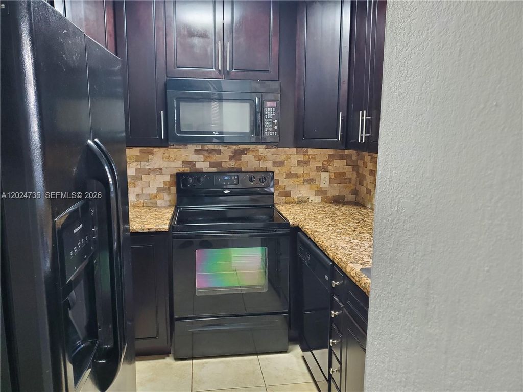 Photo of 1300 Moffett St #106, Hallandale Beach, FL 33009 (MLS # A12024735)