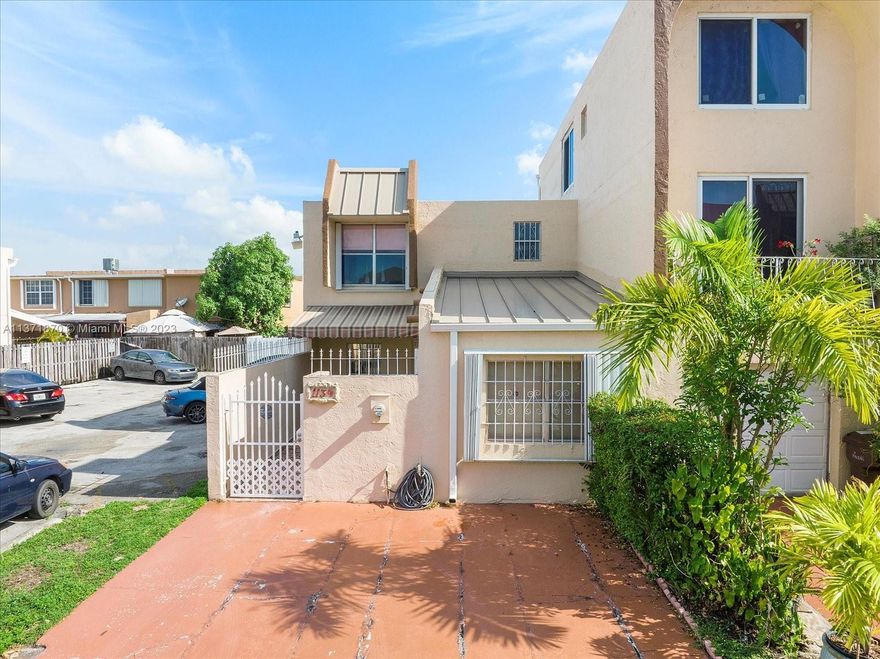 Located in the heart of Hialeah. This large 3 bedroom townhouse shows like a 4bedroom with 1,528sq ft. of  living space and 2 bathrooms. The large kitchen offers abundant cupboard space, white appliances, tile floors throughout and access to the partially covered patio/backyard with space for a full size washer and dryer.  You'll find bathrooms on both floors. This is an exceptional opportunity to get into homeownership with low monthly association fees and close proximity to many shops and more; Westland Mall, Sedanos and Navarro. Additional guest parking is available right next to the unit. This home is easy to show and very well maintained. Make plans to see it soon because it won't last long!!!