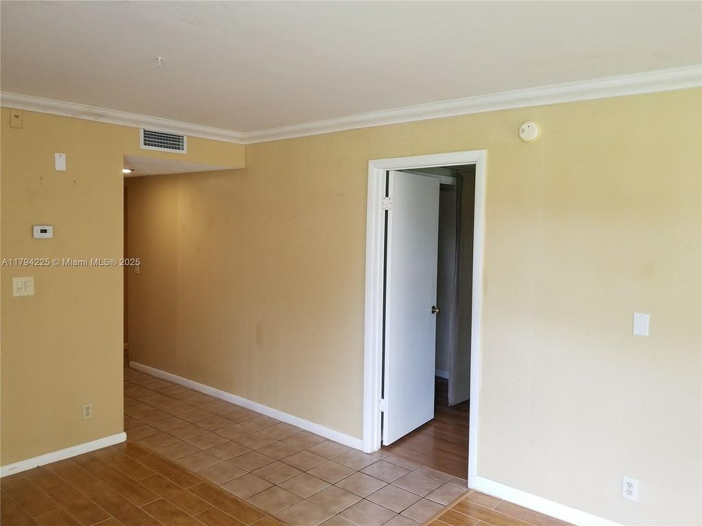 Photo of 4125 NW 88th Ave #104, Coral Springs, FL 33065 (MLS # A11794225)