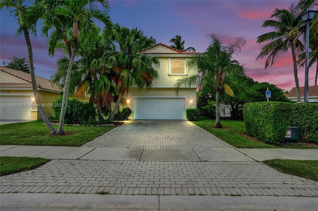 Photo of 12205 NW 56th Ct, Coral Springs, FL 33076 (MLS # A11849085)