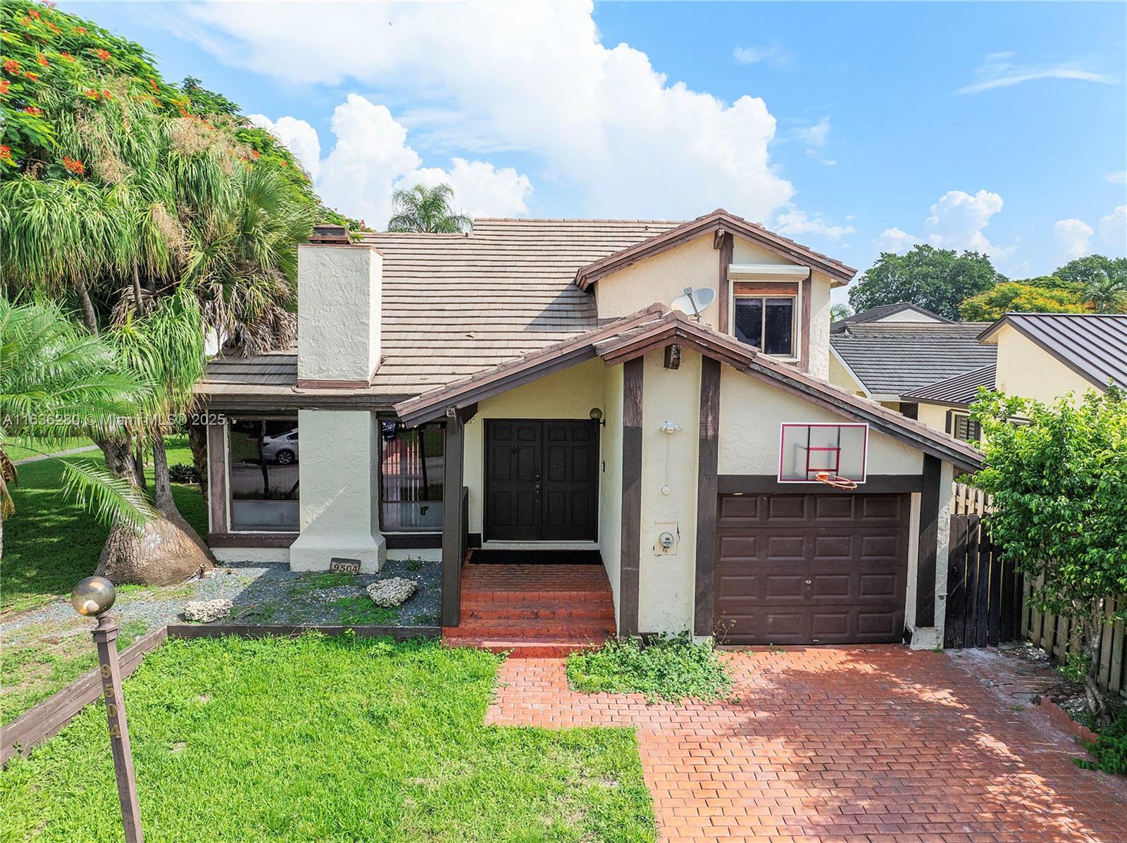 Welcome to this beautiful two-story home at the Hammocks. The layout include 3 bedrooms and 2 bathrooms upstairs, a garage converted in the fourth bedroom, a 1/2 bathroom, recreation room and laundry room downstairs. Master bedroom has a private balcony overlooking the garden and the private pool. Amenities include a stone working fire place and a pool.
The Hammocks Community offers three pool centers, parks, an exercise room, an outdoor gym, tennis, soccer, sandy beaches by the lake, and so much more. Please, schedule a private showing with 24-hour notice.