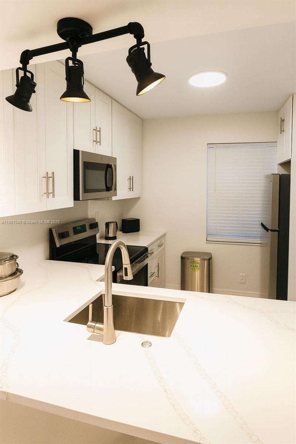 Photo of 10501 W Broward Blvd #303, Plantation, FL 33324 (MLS # A11857540)