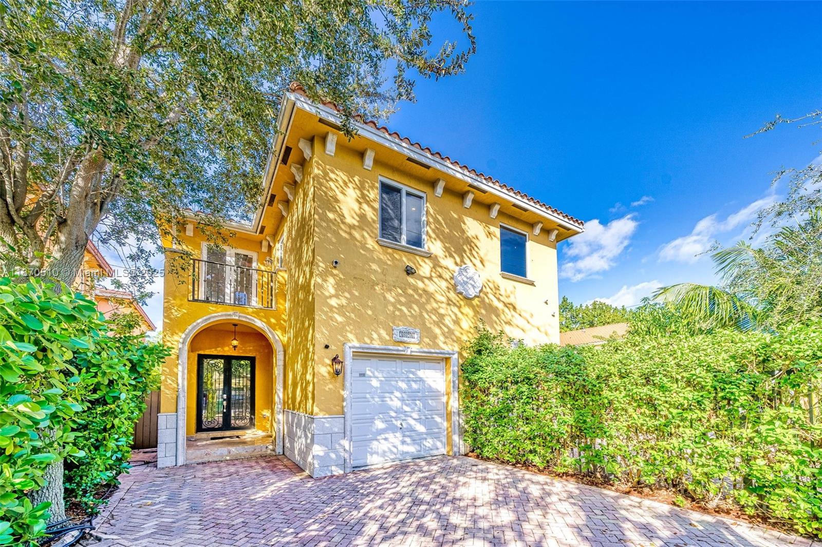 Incredibly - reconfigured Mediterranean style townhome with an open floorplan that gives the feel of new construction at a much lower cost!! Unit features include marble & wood flooring throughout, Quartz countertops, stainless steel appliances, remodeled bathrooms & spacious back patio/yard. The kitchen opens up to both the formal living & dining areas plus the family room - this is a must see!!