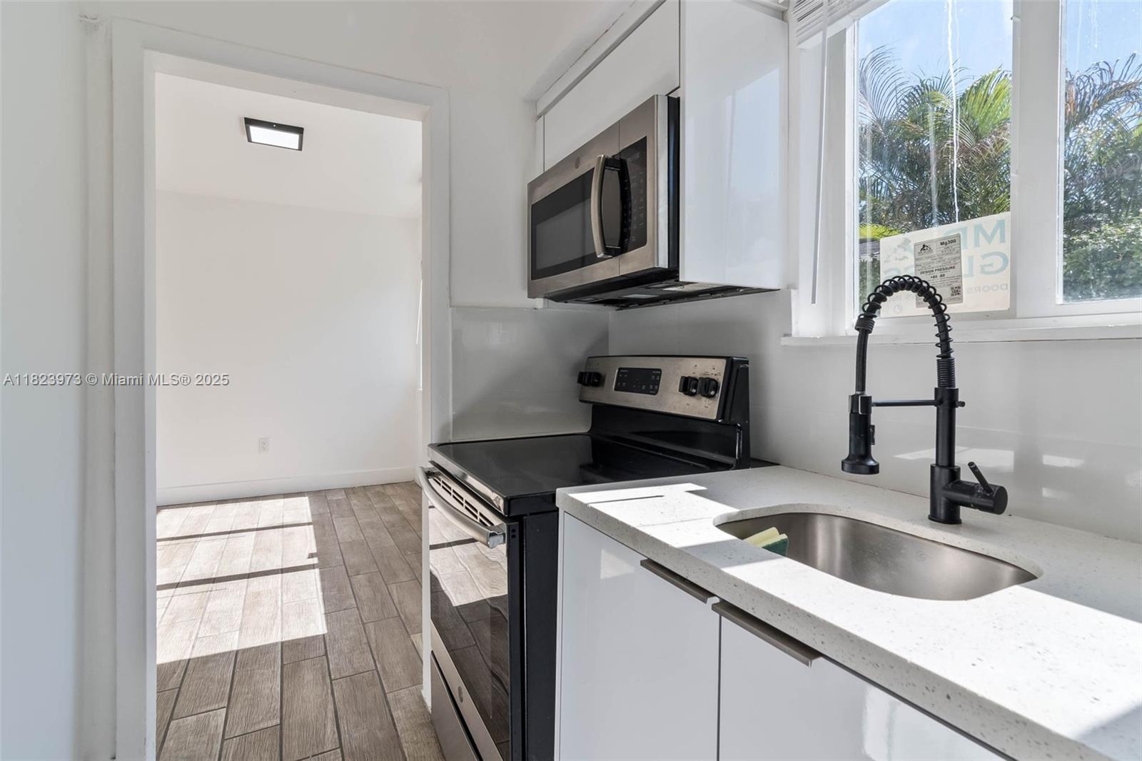 Step into this beautifully updated apartment featuring sleek tile flooring throughout, stainless steel appliances, and abundance of natural light. This unit features a chic bathroom with new fixtures, a modern vanity, and a rainfall showerhead. Brand-new, onsite laundry with card/coin-operated washer and dryer. Water and trash included along with 1 assigned parking space. Located in a quiet, desirable neighborhood, minutes to Coral Gables, Coconut Grove, Brickell and Downtown.