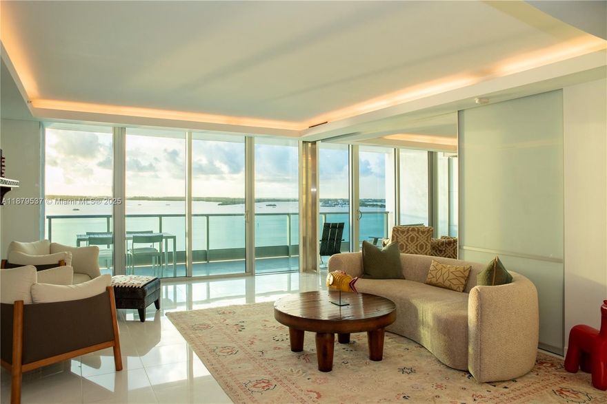 Rarely available one-bedroom residence in Jade at Brickell Bay, directly facing Biscayne Bay. This oversized unit features an expansive 213 sq. ft. balcony with breathtaking bay views, abundant natural light, and 5-star luxury living. The unit has been thoughtfully updated with an open-concept layout, recessed lighting in the living room and bedroom, a custom Italian wall-attached workspace, upgraded closets, and a two-person hot tub. Enjoy world-class amenities, including an infinity-edge pool & jacuzzi, a state-of-the-art fitness center & spa, a 48th-floor club room, a racquetball court, complimentary valet service, 24-hour concierge & security, and more. Unit includes two parking spaces (1 assigned & 1 valet) plus a separate storage locker.
