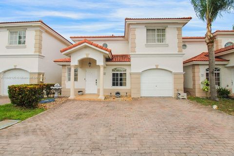 Photo of 7347 NW 173rd Dr #102, Hialeah, FL 33015 (MLS # A11842120) Photo of 7347 NW 173rd Dr #102, Hialeah, FL 33015 (MLS # A11842120)