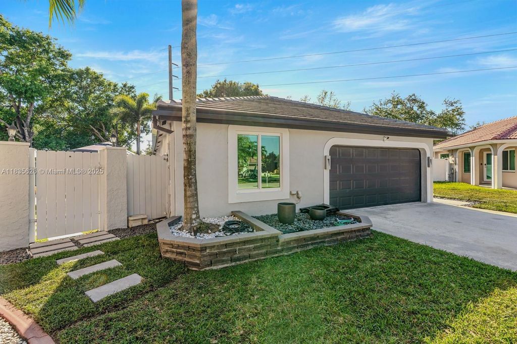 Photo of 18396 NW 6th St, Pembroke Pines, FL 33029 (MLS # A11835626)