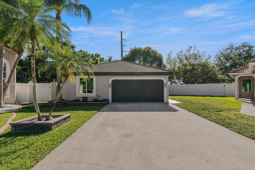 Photo of 18396 NW 6th St, Pembroke Pines, FL 33029 (MLS # A11835626)