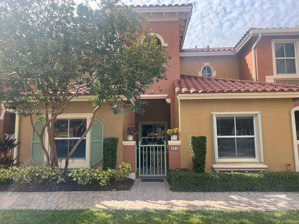 Photo of 824 SW 143rd Ter #203, Pembroke Pines, FL 33027 (MLS # A11967258)