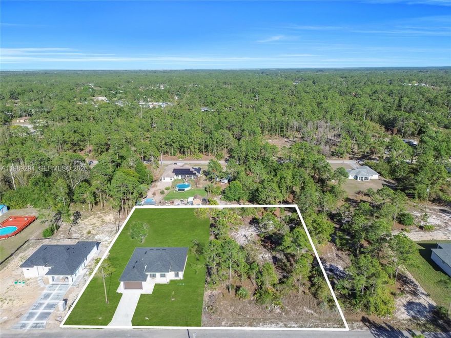 ***NEW CONSTRUCTION • HALF-ACRE INCLUDED • OPTION FOR FULL ACRE • NO HOA*** Rare opportunity to own a new construction home on a 0.50-acre lot, with the adjacent lot available (same owner) for the right price, creating a potential full-acre property. Features 3 bedrooms + DEN, 2 bathrooms, high ceilings, impact windows, quartz countertops, stainless steel appliances, and porcelain tile throughout. Located on a quiet dead-end street with plenty of space for a pool, RV, or outdoor living. Seller willing to install fence and consider concessions with the right offer. Unique flexibility rarely available in this area. Easy to show.