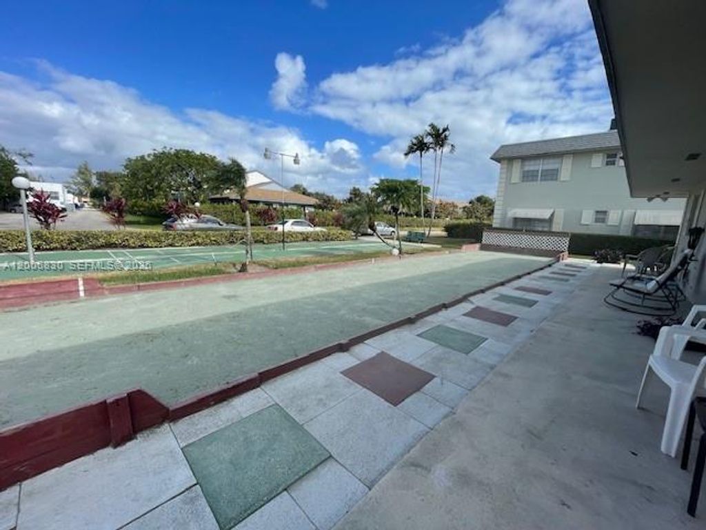 Photo of 1560 Mckinley St #101W, Hollywood, FL 33020 (MLS # A12006830)