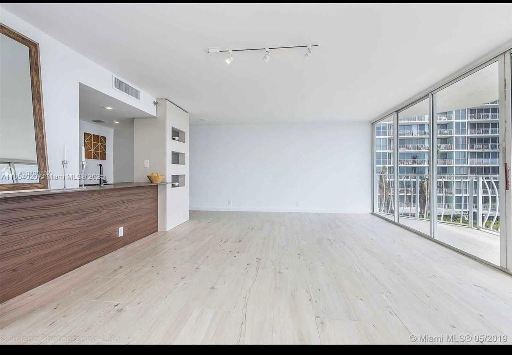 Stunning corner unit with amazing water view of the Biscayne bay and downtown Miami. 2 bedroom/2 bathrooms completely renovated from scratch with the finest material imported from Italy. Porcelain floor and marble bathrooms with double vanity and walk-in shower with massage jets, italian custom made kitchen with built in appliances, costume made luxury closets, stackable wash and dryer, brand new A/C unit and water heater. Flexible floor plan with one of the bedroom that can be opened up to the living room area thanks to the telescopic doors system. FULL SERVICE BUILDING with gym and olimpic size pool. Additional parking/marina are available to buy/rent.