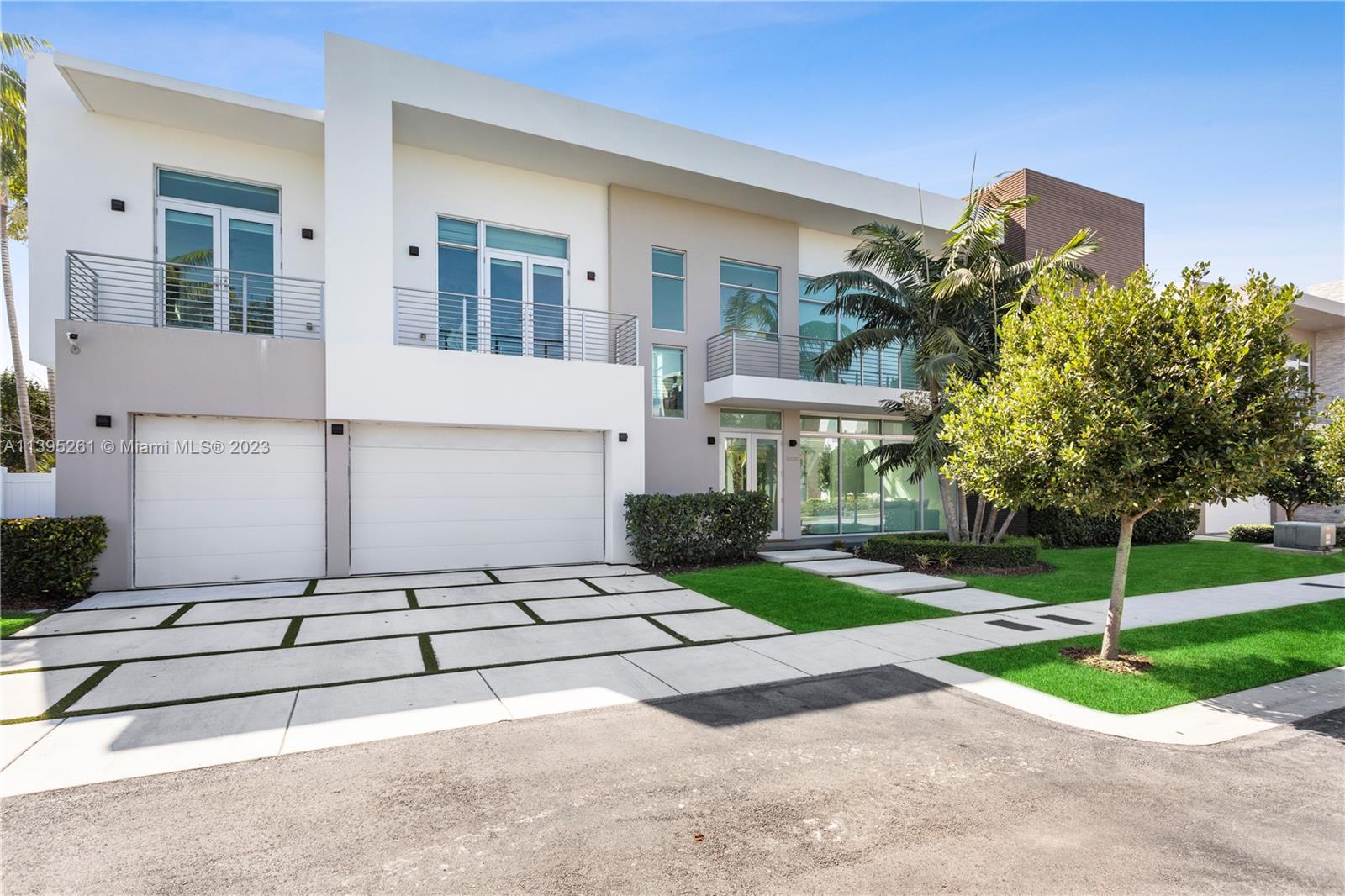 Experience the most luxurious two story Modern single family home in The Mansions at Doral on a double-size lot.
Beautiful Pool & patio, rooftop terraces within a newly established gated-community of 59 customizable homes. This Mansion has great natural light, an open floor plan and grand ceilings. It includes 4 bedrooms upstairs, 2 downstairs and a GUEST HOUSE. The master bedroom has a a custom walk-in closet, massive bathroom with walk-in shower and jacuzzi. Outdoor amenities showcase 2 rooftop terraces, 1 summer kitchens, pool, jacuzzi. It has a 3 car driveway + 3 car garage. It features a gourmet kitchen with custom cabinetry, appliances (Subzero & Wolf), a stylish island with an attached dining area. Close to the best schools in Doral. Call Listing Agent for more details !