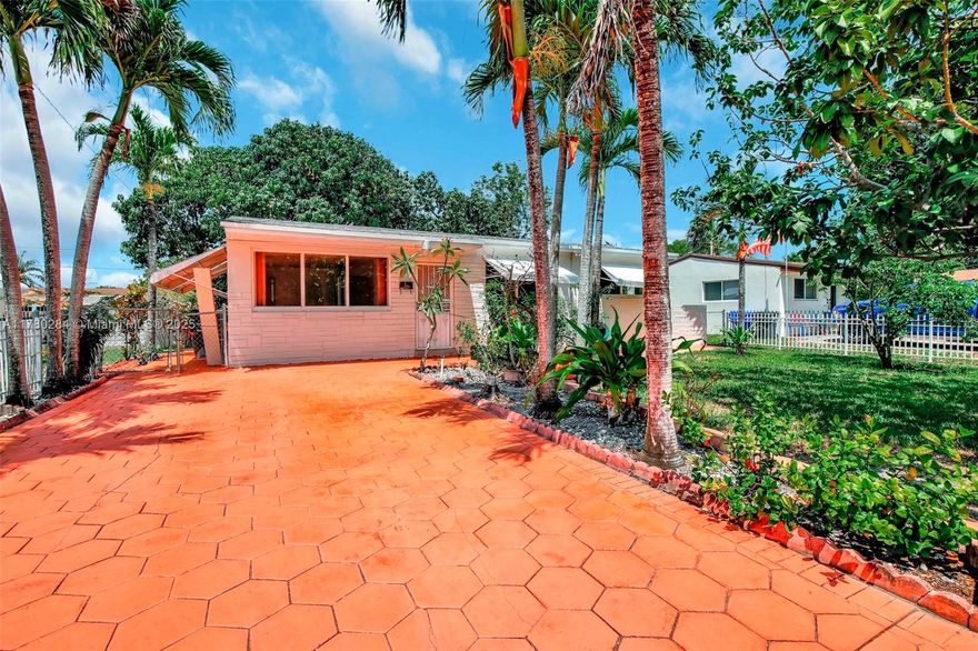 Welcome to your freshly painted 3 bd/2 bth dream home in the heart of Hollywood boasting brand new SS appliances, tile flooring throughout. Step outside to the screened covered patio & large backyard, complete w/lush fruit trees, providing a serene oasis for relaxation & entertaining. The roof is only 3 years old, ensuring peace of mind for years to come. Say goodbye to cold showers w/the tankless water heater, and rest easy during hurricane season w/the impact windows. This centrally located home is just minutes away from shopping, restaurants, & all the entertainment that Hollywood has to offer. Don't miss out on this rare opportunity to own a piece of paradise in one of the most sought-after neighborhoods in South Florida. Schedule a showing today & make this house your forever home!