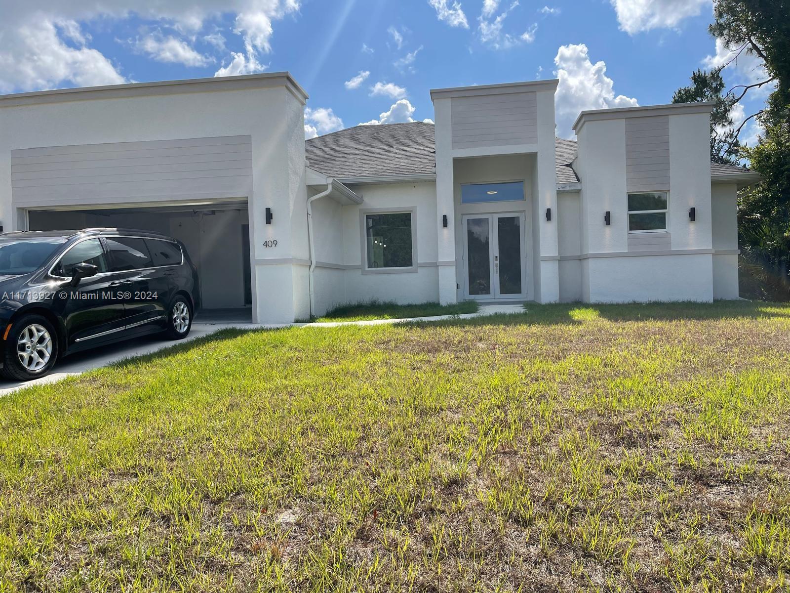 Property for Sale at 409 S Columbus Blvd, Lehigh Acres, Lee County, Florida - Bedrooms: 4 
Bathrooms: 2  - $338,000