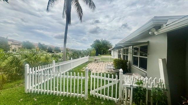 Photo of 4805 NW 49th Rd, Tamarac, FL 33319 (MLS # A12030797)