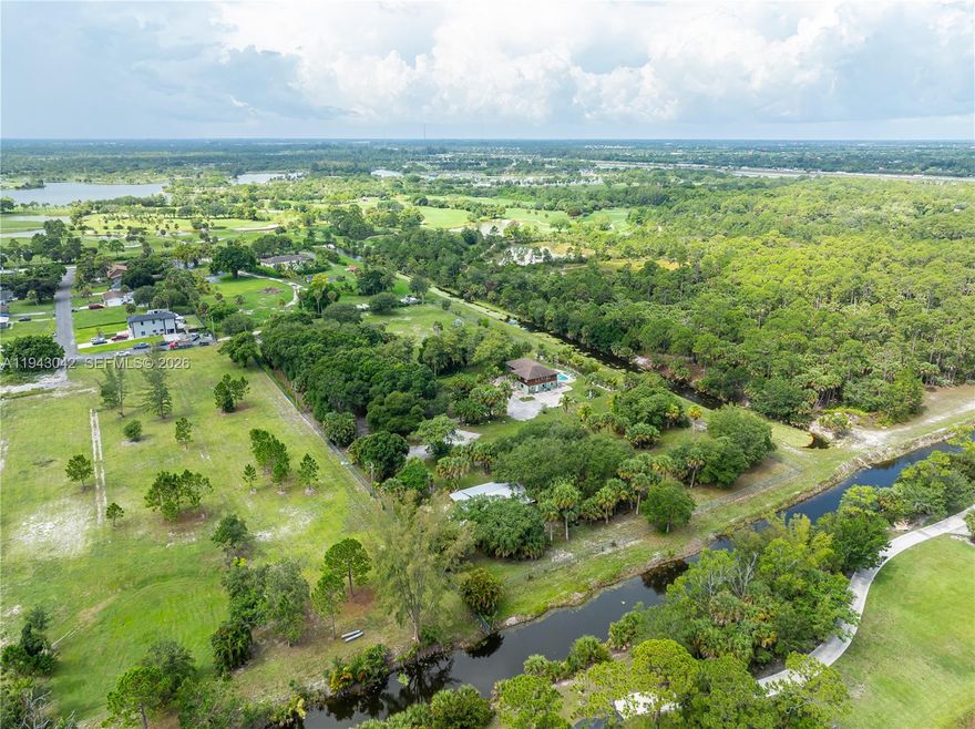 Stunning single-family home in West Palm Beach offering spacious living and breathtaking views. Enjoy abundant natural light throughout, with an open-concept kitchen perfect for entertaining. Relax by the saltwater pool and take in the serene lake views. The expansive patio overlooks the Okeeheelee Nature Center, ensuring privacy with no neighbors behind. Additional features include a spacious open balcony, walk-in closets, and ample storage space. Ideally located just minutes from Florida’s Turnpike, major parks, and shopping plazas. This home is a must-see!