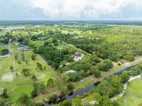 Photo of 576 Marshall Rd, West Palm Beach, FL 33413 (MLS # A11943042)