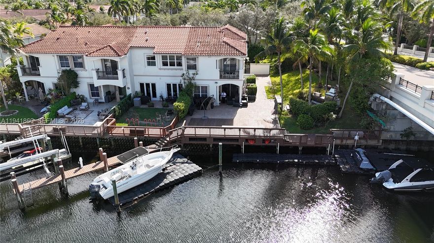 Boater’s Dream Home! This stunning 2-story townhouse on an oversized corner lot (9,237 SF almost triple thatofother towhouses) in the exclusive gated community of Harbor Islands is perfect for water enthusiasts. Situatedona canal with two wooden docks for boats (one is 50 ft long) and two floating docks for your boats, jet skis,orwatercrafts, this beautiful home offers 3 spacious bedrooms, a loft, a separate office, 3 full baths, 1 half bath,andample storage. Enjoy 24/7 guard security and world-class amenities, including a spa, gym, tenniscourts,basketball courts, a game room, clubhouse, playgrounds, parks, a community pool, and scenic walkingtrails. Livethe ultimate waterfront lifestyle!