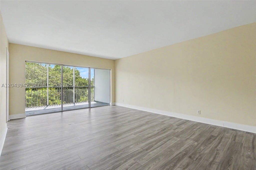 Photo of 3250 N Palm Aire Dr #406, Pompano Beach, FL 33069 (MLS # A12043942)