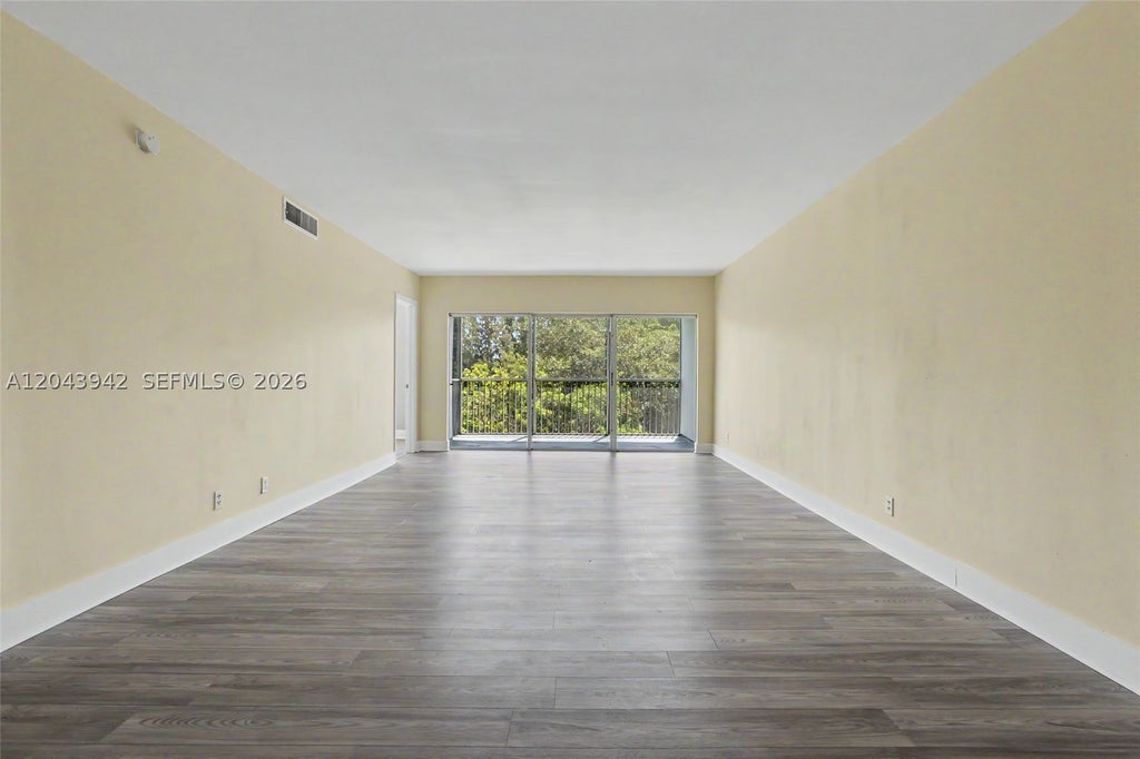 Photo of 3250 N Palm Aire Dr #406, Pompano Beach, FL 33069 (MLS # A12043942)