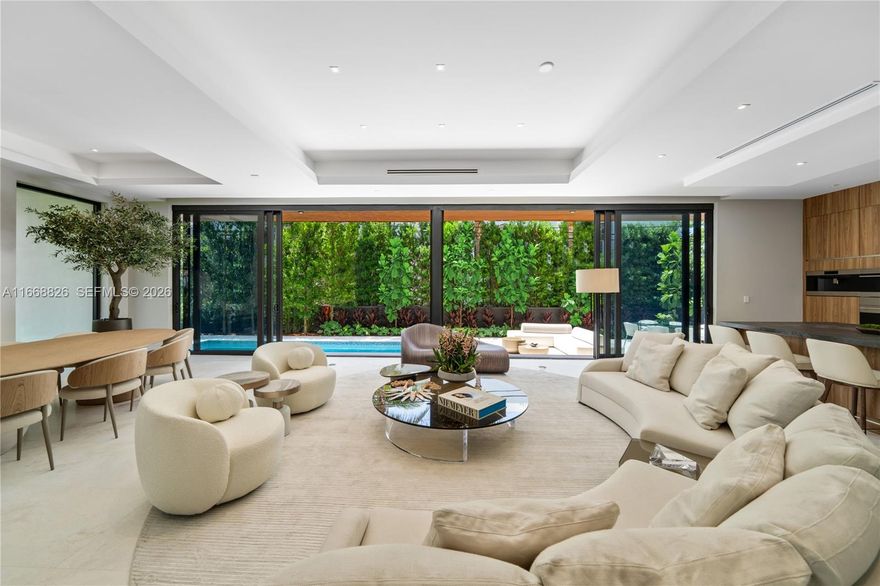 BRAND NEW BUILD MODERN ESTATE IN THE HEART OF SUNNY ISLES BEACH! Furnished by Artefacto! Modern Tropical Oasis Lined with Lush Landscaping Encompassing 5 Bedrooms + 5 Baths + Powder Room in 4,140 Interior SF on 7,500 SF LOT. Open Floorplan with Calacatta Flooring on Ground Level featuring Entertaining Spaces + Wine Cellar. Soaring Ceilings with Recessed Lighting & Drop Ceilings. Spacious Primary Suite with Dramatically-Lit Accent Wall. Custom Italian Kitchen with Oversized Island Countertop & SubZero Appliances. Primary Baths with Hansgrohe & Duravit Fixtures + Rainshower. Indoor/Outdoor Living with Deck Perfect for Entertaining. Located in the Heart of Sunny Isles Beach, Near Aventura Mall, Dining & Oleta River State Park. Ready to Move In!