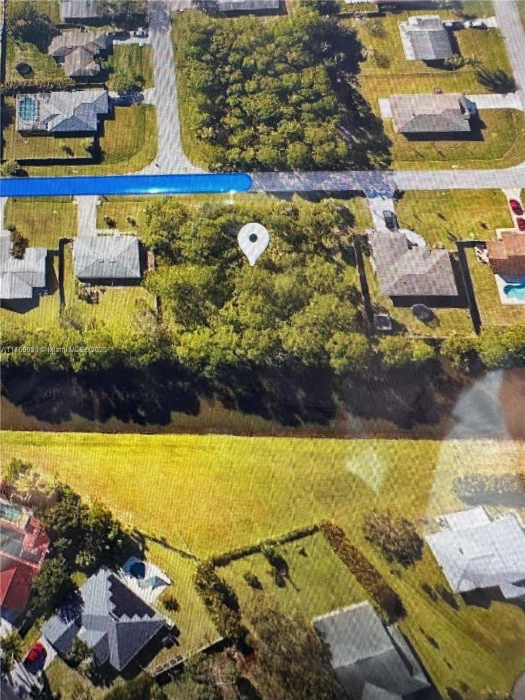 Photo of 841 Archer Ave, Port Saint Lucie, FL 34983 (MLS # A11769981)