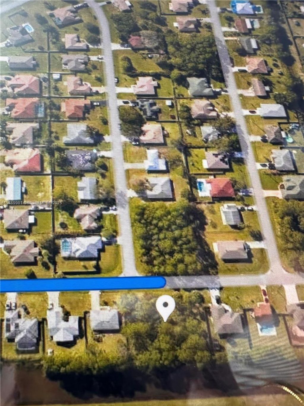 Photo of 841 Archer Ave, Port Saint Lucie, FL 34983 (MLS # A11769981)