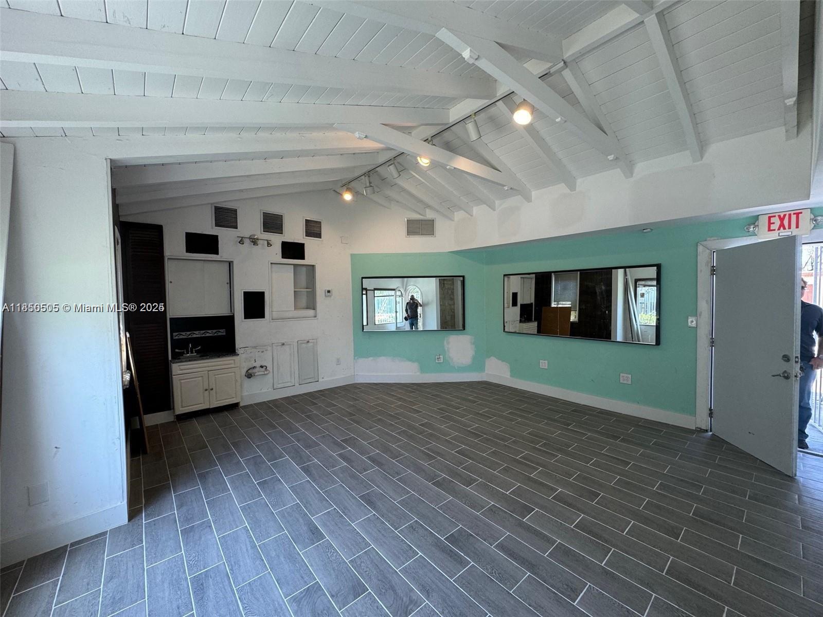 Discover an exceptional opportunity at 611 NE 86th Street, perfectly positioned just off Biscayne Boulevard in the heart of Miami’s sought-after Upper East Side. This unique property is zoned for both residential and commercial use, offering incredible flexibility for a variety of purposes — whether you’re looking to live, work, invest, or combine it all in one dynamic space. With excellent visibility, easy access to major roads, and onsite parking, the property is ideal for a professional office, boutique retail, creative studio, short-term rental, or a stylish live/work setup. Just steps from trendy cafes, waterfront parks, local shops, and art galleries, the location blends neighborhood charm with urban convenience. Opportunities like this rarely come along.