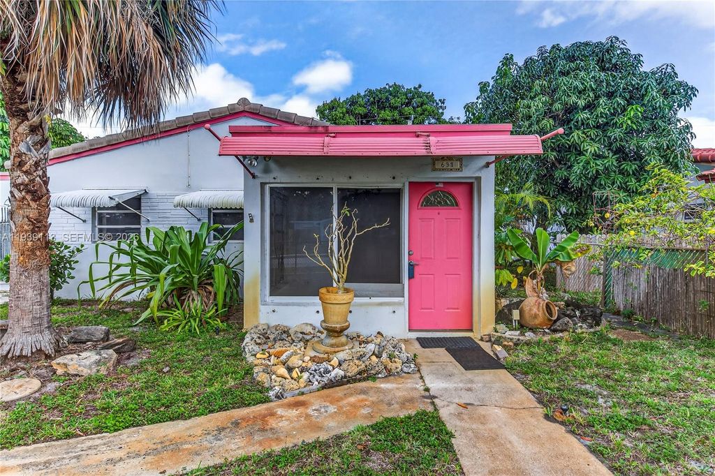 Photo of 631 NE 56th Ct, Oakland Park, FL 33334 (MLS # A11939113)