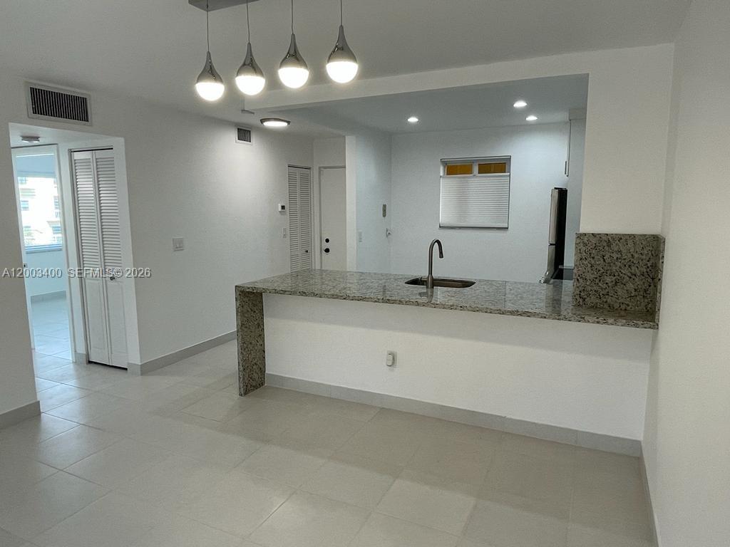 7732 Camino Real F-318