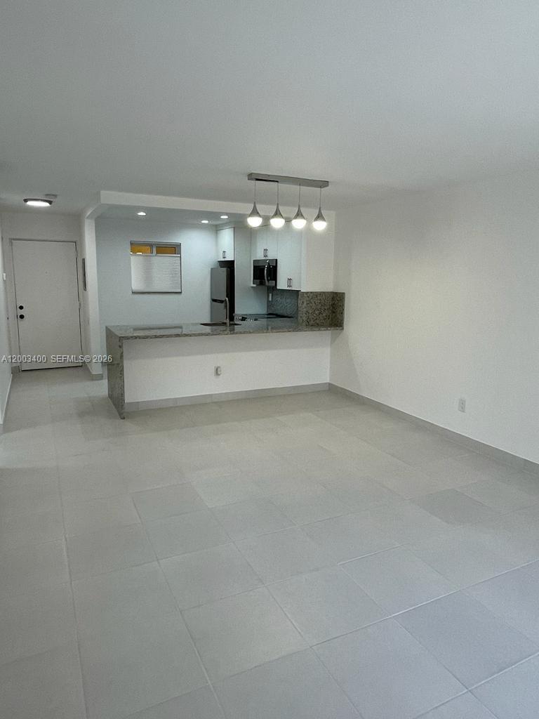 7732 Camino Real F-318