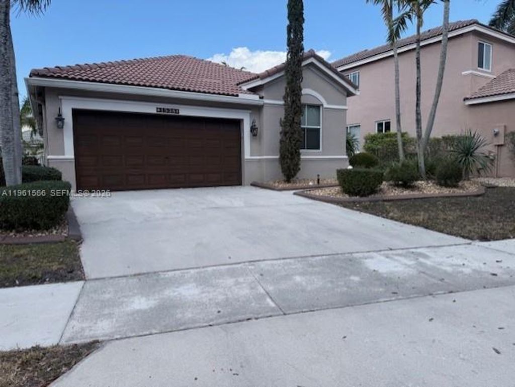 Photo of 1538 Winterberry Ln #0, Weston, FL 33327 (MLS # A11961566)