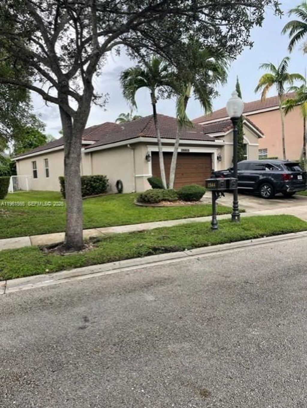 Photo of 1538 Winterberry Ln #1538, Weston, FL 33327 (MLS # A11961566)