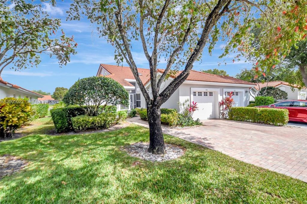 Photo of 7713 Springwater Pl #A, Boynton Beach, FL 33437 (MLS # A12005022)