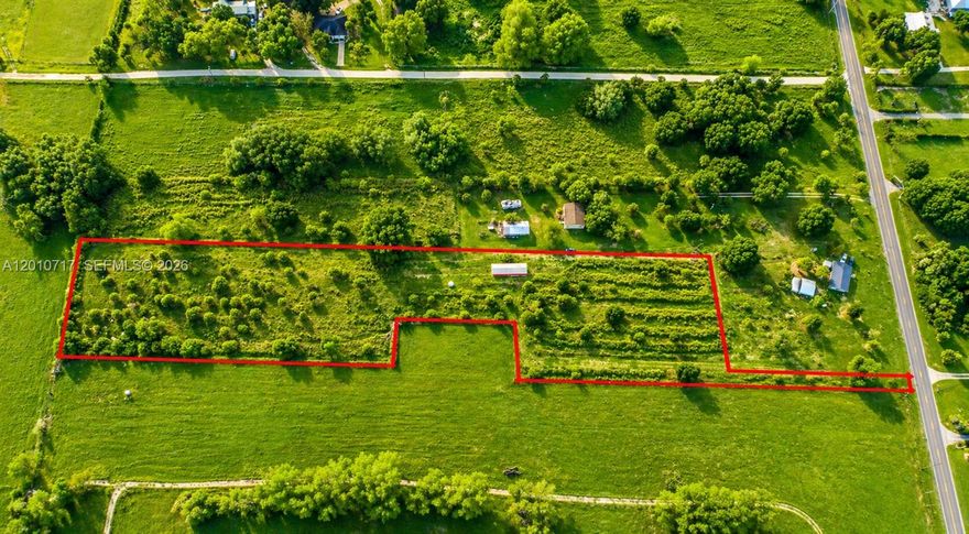 Now available-this beautiful 5.05-acre tract offers the perfect blend of privacy, space, and convenience in one of LaBelle's most desirable areas. Tucked away behind an existing residence on a 1+ acre parcel, this secluded homesite provides peaceful setting with the added benefit of a deeded roadway for access. The acreage is cleared and dotted with scattered trees, creating a picturesque canvas ready for your dream home. Zone Agricultural Residential, this property allows for animals, making it ideal for those seeking a mini-farm, equestrian setup, or a true country lifestyle. A 20' x 60' steal equipment carport is already in place-perfect for storing machinery, RV's, boats, or building materials while you develop the property. Located just west of town near the Fort Denaud Bridge, this property offers easy access to LaBelle, Fort Myers, and Interstate 75, making commuting and travel convenient while still enjoying the tranquility of country living. Please note: Property will require installation of a well and septic system. Don't miss this opportunity to own a private slice of Southwest Florida with room to grow!