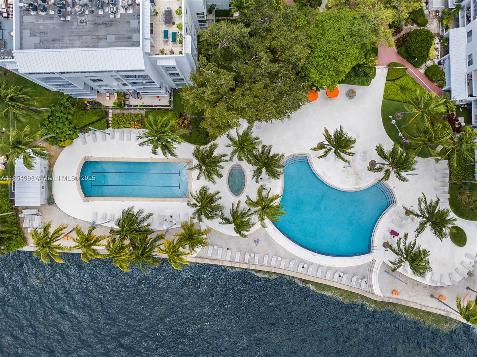 Spacious 1/1 unit with 775 sqft in the highly sought-after Nirvana Condominium. This unique waterfront property offers amazing views of the bay and a true sense of community. Features include an open layout, abundant natural light, tile floors, and a private balcony. Enjoy resort-style amenities: two pools, gym, steam room, beach volleyball, and lush tropical grounds with bayfront access. Gated community with 24-hour security, ideally located near Midtown, Design District, and Wynwood. Perfect for investors or end users.