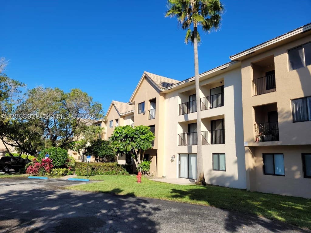 Photo of 10001 W Atlantic Blvd #324, Coral Springs, FL 33071 (MLS # A12058933)