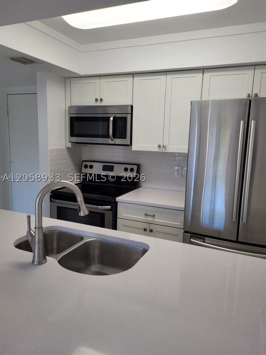 Photo of 10001 W Atlantic Blvd #324, Coral Springs, FL 33071 (MLS # A12058933)