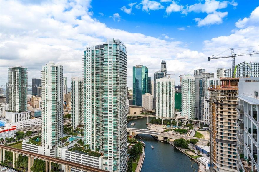 Upper floor 1BD/1.5BA in Latitude on the River, a waterfront Brickell high-rise steps to Brickell City Centre. Residence #3605 offers river + skyline views, floor-to-ceiling windows, sunset balcony, modern kitchen & stainless appliances, walk-in closet. Full-amenity tower with 24/7 concierge, valet, fitness center, spa, pool, theater, and club room. Investor-friendly and pet-friendly. Prime walkable location near dining, shops, parks & transit. Easy to show & move-in ready.
