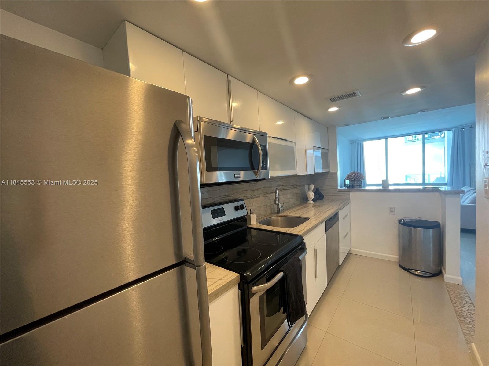 Spacious oversized studio with Bay View at Mirador 1000! Impact windows, Updated open kitchen, great for entertaining and nice bathroom, tons of closet space (4 closets in a studio!!), great layout. Excellent location just across the street from Whole Foods, minutes to the beach and Lincoln rd shoppes, local restaurants, Brand new Five park & Flamingo Park, South of Fifth, favorite grocery stores, tennis courts and much more! Basic cable and Wifi included in the rent and provided by association! Valet parking available at an additional small cost. New pool deck! New Hallways and Lobby Design!