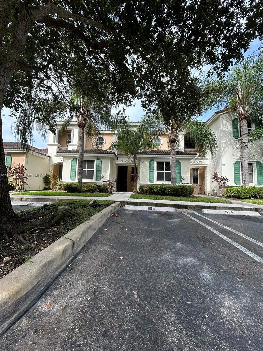 VERY BEAUTIFUL AND QUIET GUARD GATED COMMUNITY WITH WALKING TRAILS, ACCESS TO POOL & GYM IN THE MAIN CLUB HOUSE! PROPERTY HAS 2 ASSIGNED PARKING SPACES IN FRONT OF UNIT AND GUEST PARKING! DISCOVER THE PERFECT BLEND OF CONVENIENCE AND VALUE IN THIS TOWNHOME WITHIN HOMESTEAD'S GATED MARBELLA BAY COMMUNITY. ENJOY A BEDROOM AND COMPLETE BATHROOM ON THE FIRST FLOOR, PLUS AN IN-HOME WASHER/DRYER WITH PLENTY OF STORAGE SPACE. TOTAL OF 3 BEDROOMS 3 BATHROOMS, ALSO SPACIOUS PANTRY AND AN AREA PERFECT FOR A MINI HOME OFFICE. LIVING ROOM WITH SLIDING DOORS THAT WELCOME YOU TO A BEAUTYFUL LAKE VIEW WHERE YOU HAVE ACCESS TO STORAGE CLOSET. EASY TO SHOW!