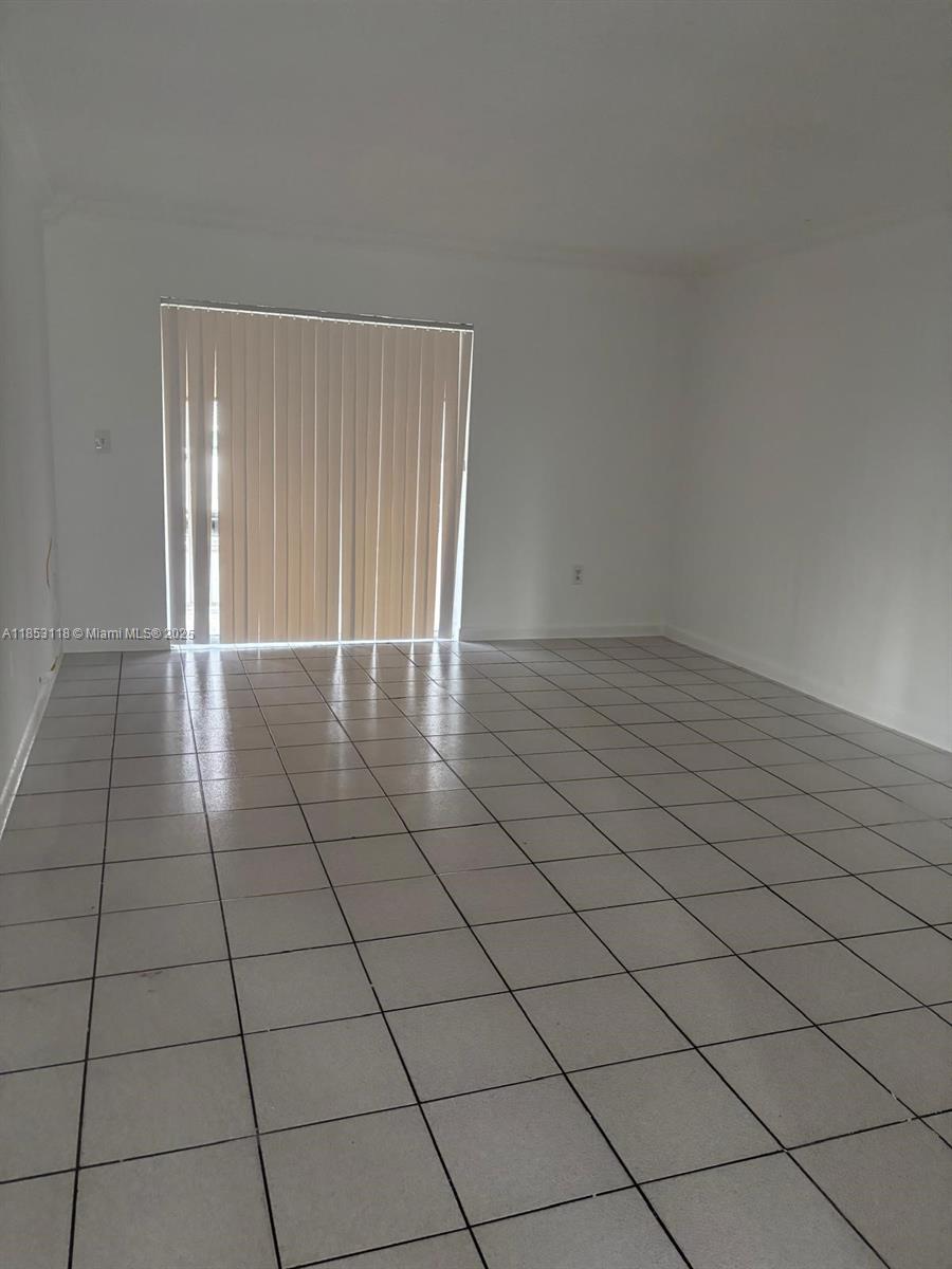 Spacious 2-bed/2-bath in Terrazas del Sol, Hialeah. First-floor unit—no stairs! Freshly painted, includes in-unit washer & dryer. Prime location!