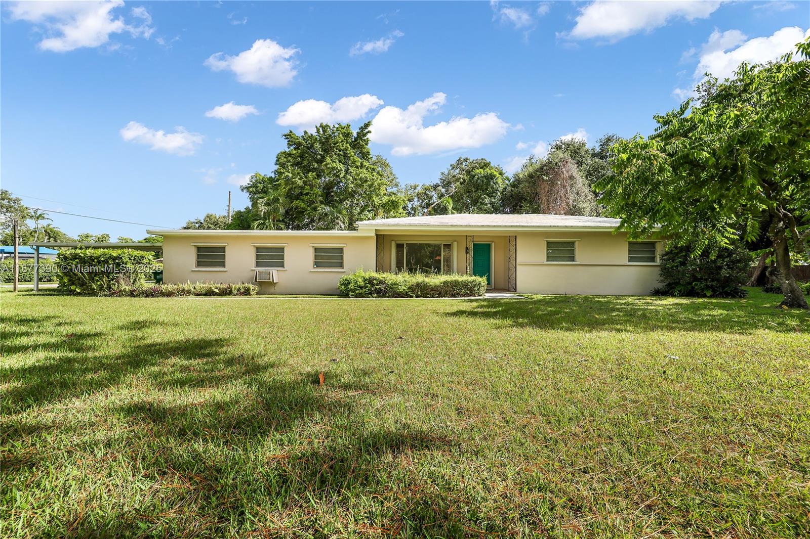 Spacious and charming single-story, single-family home located in a highly desirable residential neighborhood, just steps from Coral Lake. Situated on a large corner lot of over 35,000 SF, the property is surrounded by a beautiful yard. This 3bed/2bath features an additional extra-large room, ideal for entertaining, fitness activities, or recreational use. Additional highlights include a sunroom, garage, a carport accommodating two vehicles, and ample driveway parking. Minutes from the University of Miami, Coral Gables, major hospitals, shopping centers, dining, & entertainment, this property offers easy access to highways, airport, & seaport. Excellent opportunity for those seeking both comfort and convenience in a prime location.