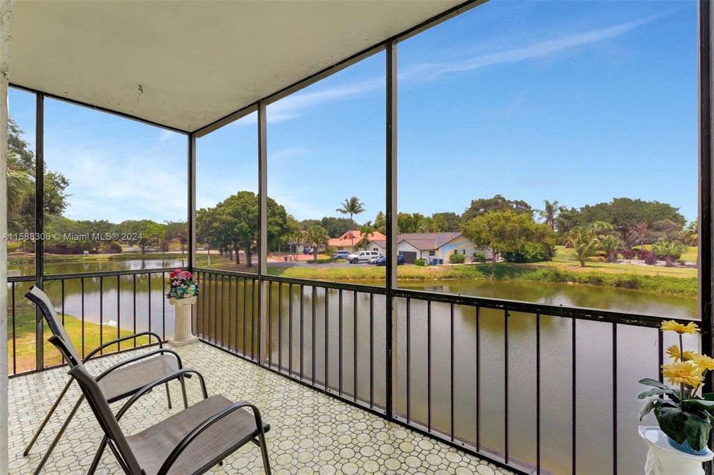 Photo of 8951 N New River Canal Rd #2C, Plantation, FL 33324 (MLS # A11588306)