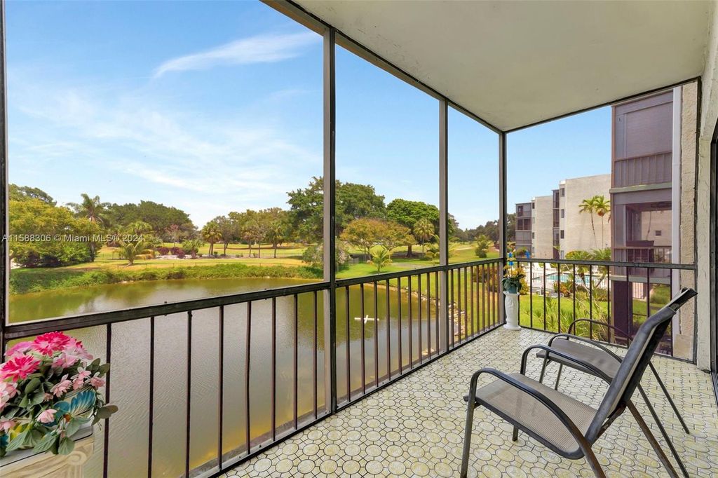 Photo of 8951 N New River Canal Rd #2C, Plantation, FL 33324 (MLS # A11588306)